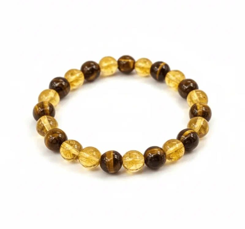 A product photograph of the Citrine & Tiger Eye beaded bracelet on a white background. for Healing Meditation and Abundance