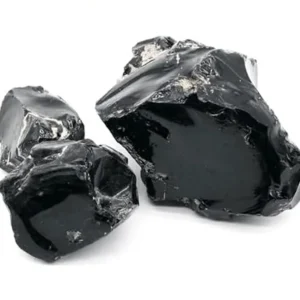 natural raw black obsidian chunks isolated on a white background, highlighting the stone's smooth, reflective, glass-like surfaces and conchoidal fractures.