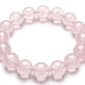 Top-down commercial product photograph of a natural, premium gem-grade American Rose Quartz 13mm beaded bracelet made of approximately fifteen (15) chunky, perfectly round beads on a pure #FFFFFF white background. The large, substantial beads showcase a delicate, soft, and very pale "light pink" hue with a natural semi-translucent, watery glow characteristic of high-quality natural quartz. Each highly polished bead is unique, exhibiting subtle, faint internal veining, icy mist, and natural micro-fractures that catch the light without losing the stone's signature gentle pink hue. Strung tightly on a clear cord, the 13mm beads display a vitreous, glass-like luster with soft natural drop shadows, ideal for Heart Chakra work and attracting love.